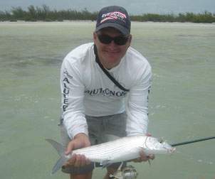 Man holding up a Bonefish with both hands