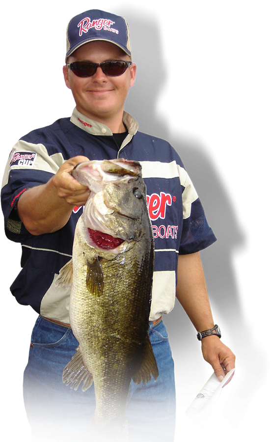 Captain holding up a Largemouth Bass